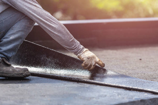 Professional Basement Waterproofing technician working in Brookville, OH